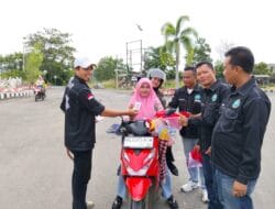 Sambut HUT RI ke 80 DPC Y-GANN Way Kanan Bagikan Bendera dan Stiker Edukasi anti narkoba